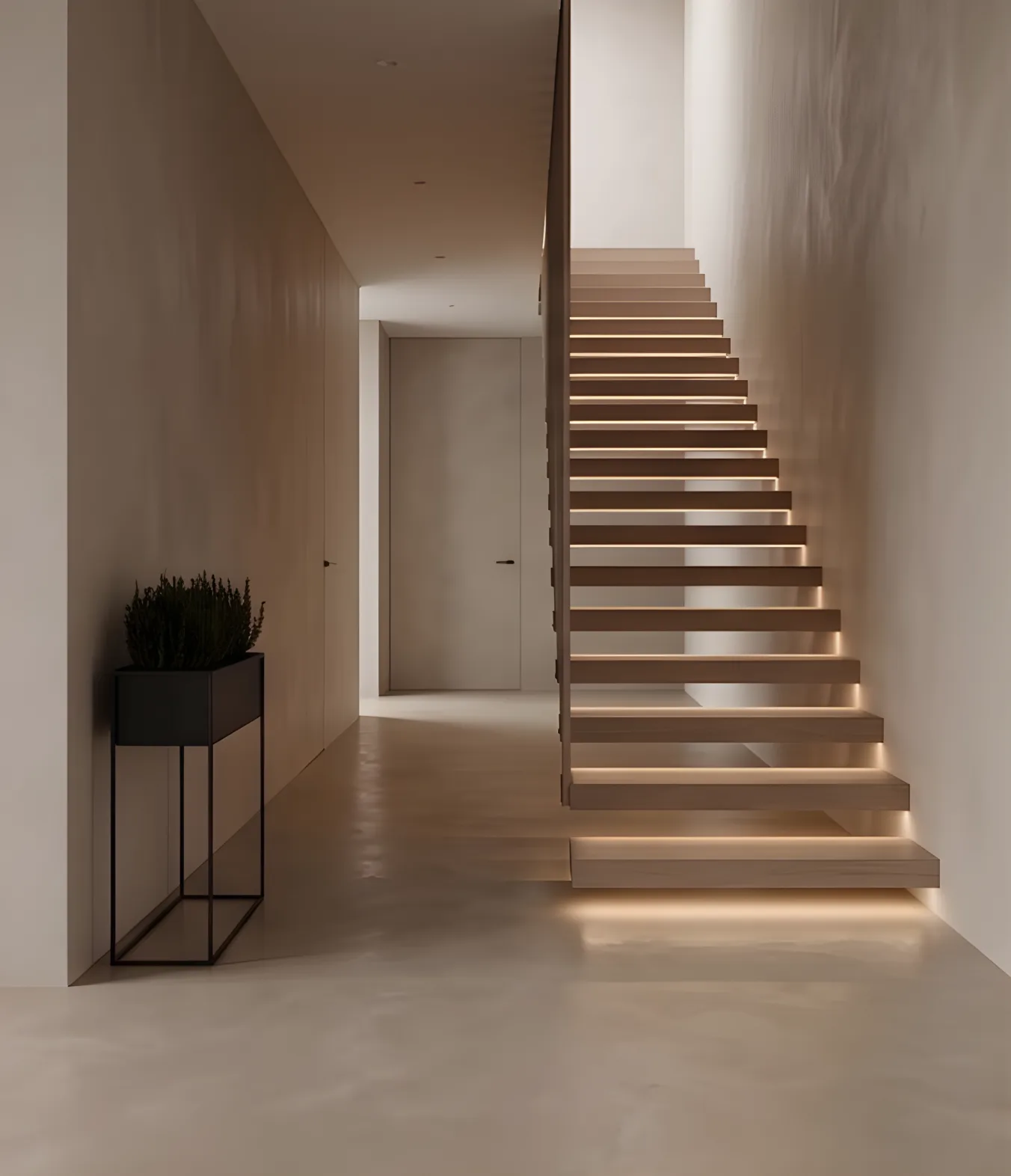 Fugenlose Treppe mit indirekter Beleuchtung in einem modernen Innenraum
