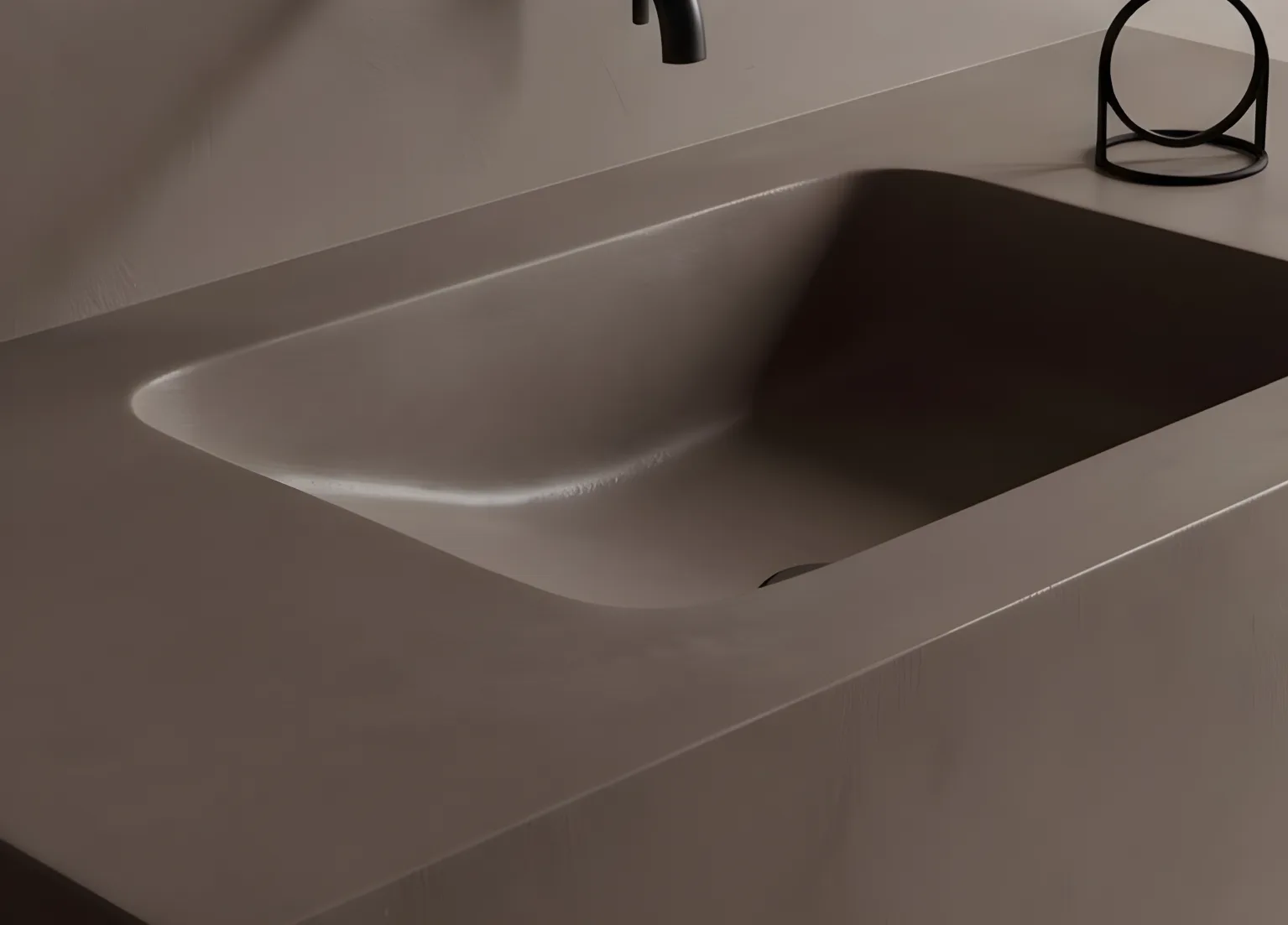Mikrozement Waschtisch in eleganter, fugenloser Gestaltung mit modernem Armatur und minimalistischem Design